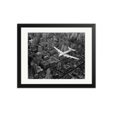 DC-4 Above Manhattan