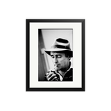 Dennis Hopper Lights His Cigarette